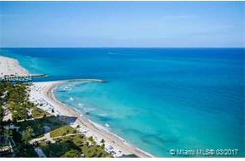 Building Photo - 10203 Collins Ave