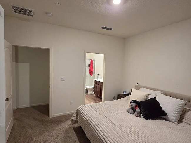 Building Photo - This stunning three-bedroom, two-bathroom home offers an incredible amount of space and upgrades,...
