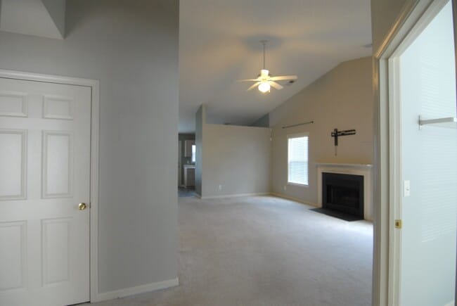 Building Photo - Charming 3 bedroom 2 bath Townhouse w/ fenced in yard located off Guilford College Road!
