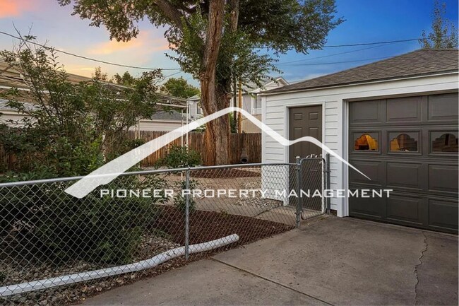 Building Photo - Downtown Charm with Private Yard, Oversized Garage and AC