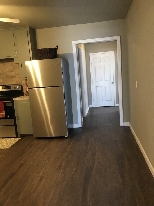 Building Photo - PRE -LEASING FOR AUGUST 1ST! 4 Bedrooms/2 ...
