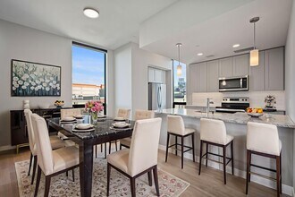 Experience seamless living with open-concept designs, merging kitchen and living spaces. - Windsor 3000 Huron