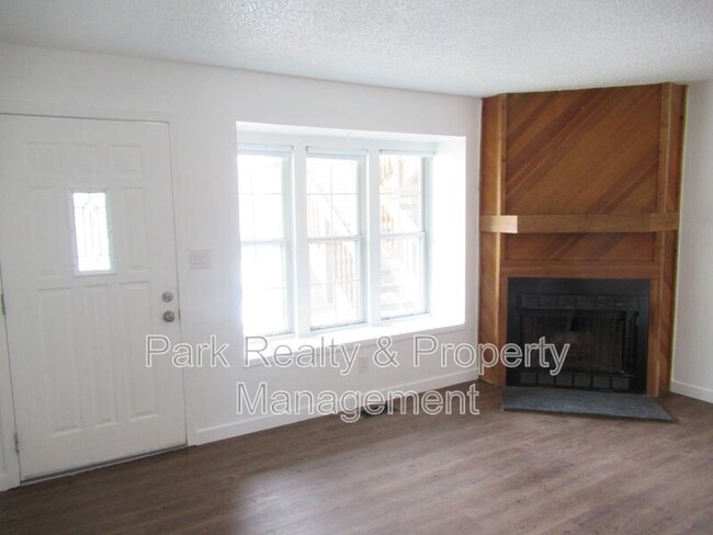 Building Photo - 9617 W Chatfield Ave