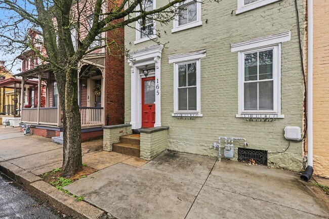 Building Photo - One bed, partially furnished, all utilities included