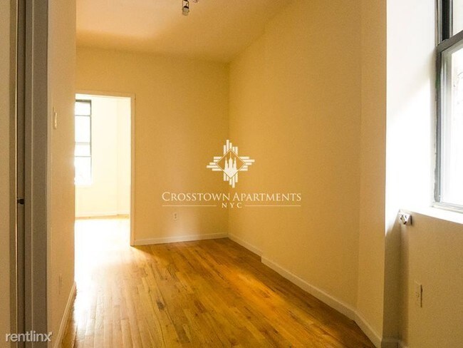 Foto del edificio - 209 E 3rd St