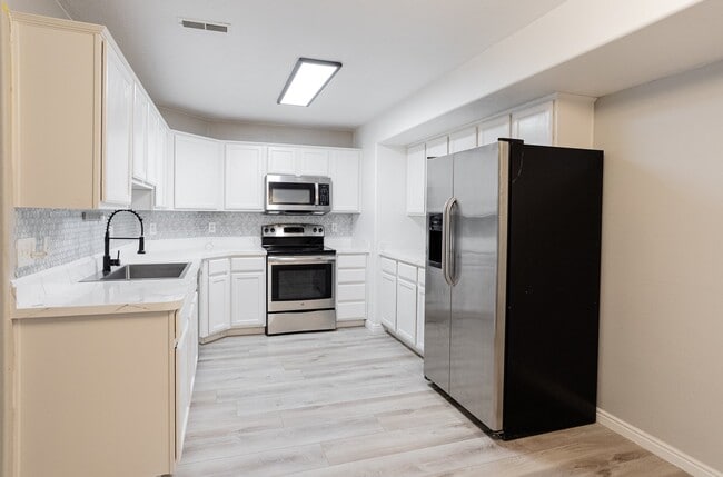 Building Photo - 8084 N Ridge Loop E