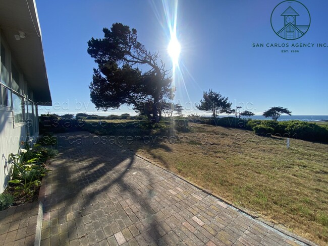 Building Photo - Three Bed Pebble Beach Home on MPCC Shore ...