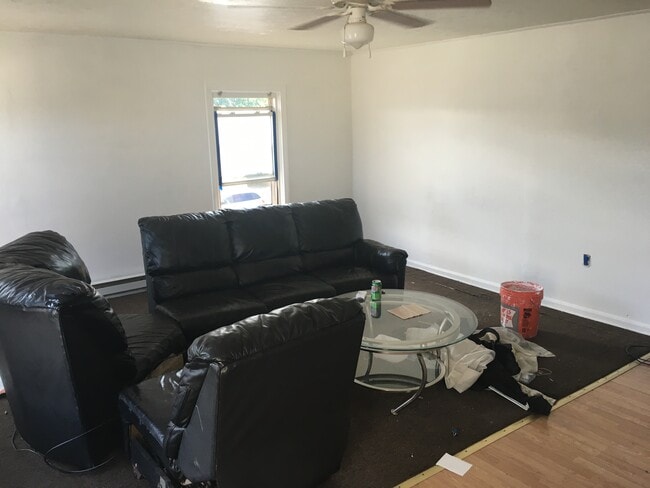 newer furniture and painted light grey - 167 S Bridge St