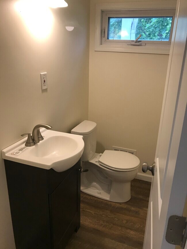 First floor half bath. - 29 Harwin Dr