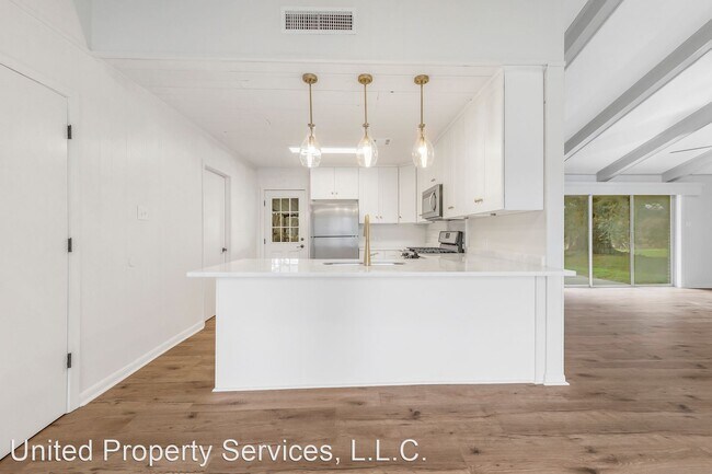 Foto del edificio - 4 br, 3 bath House - 100 Pamaleen Drive