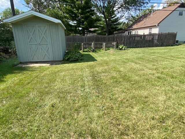 Shed in the yard - 205 W Burnett Rd