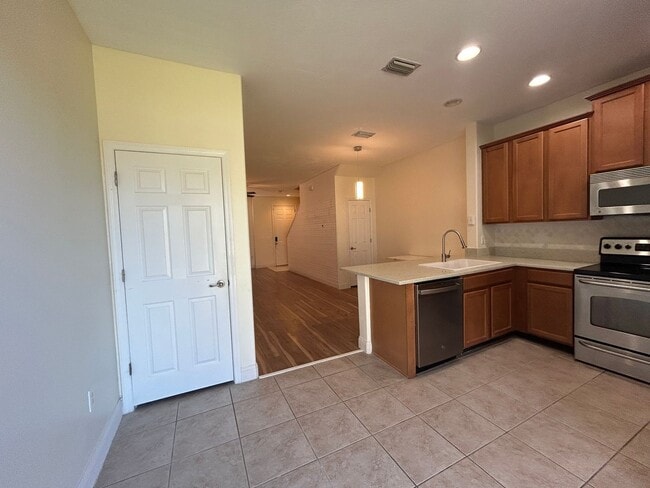 Building Photo - Charming Sawgrass Village Townhome with Pond Views & Modern Comfort