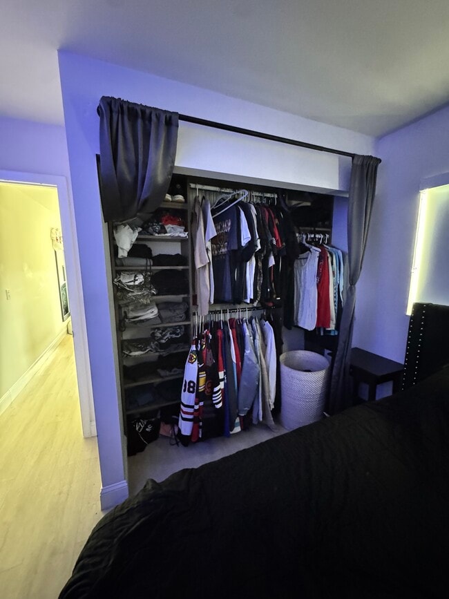 Closet with curtains - 2161 NW 89th Ter