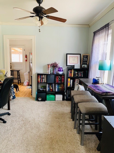 Dining room leading into the kitchen. - 211 E Vermilya Ave