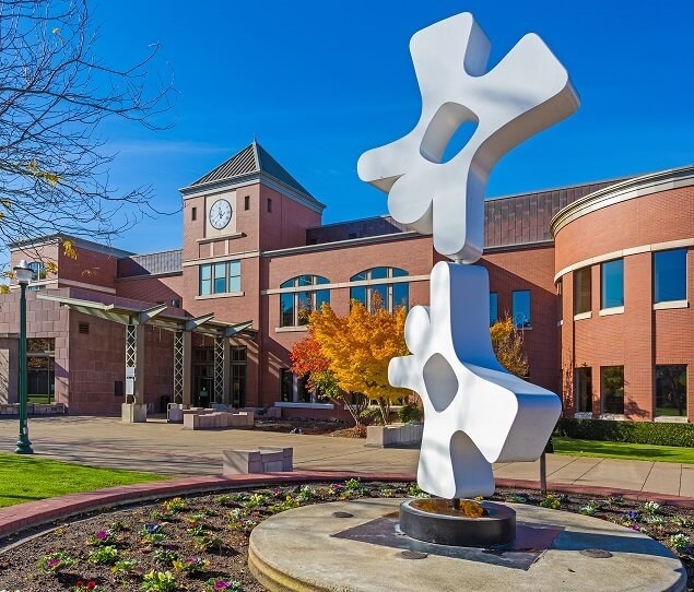 The two-story Puyallup Public Library is located near Pioneer Park