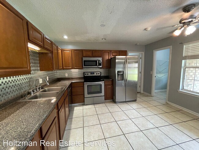 Foto del edificio - 4 br, 2 bath House - 905 Rice Court