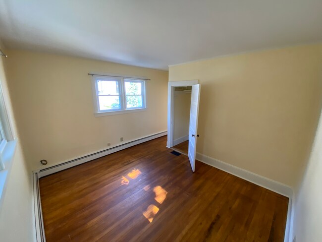 Back bedroom off of kitchen with a deep closet - 1168 Washington St