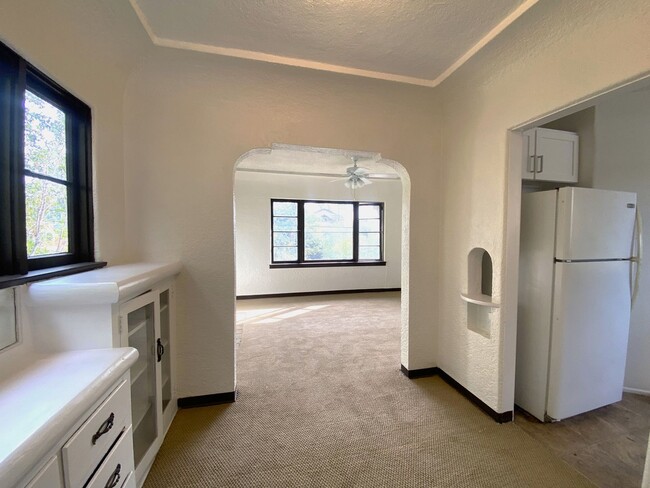 Building Photo - Craftsman Style One Bedroom with Decorative Fireplace! On Site Washer and Dryer & Assigned Storag...