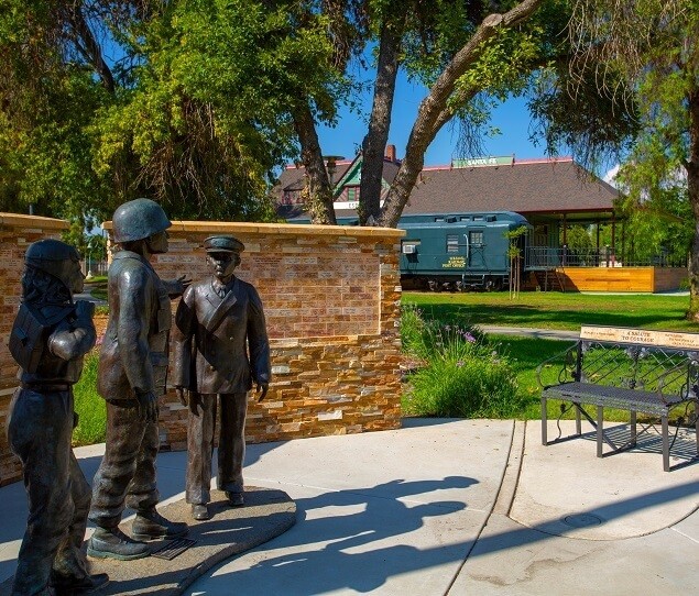 The “Military Tribute” sculpture is located in Grape Day Park