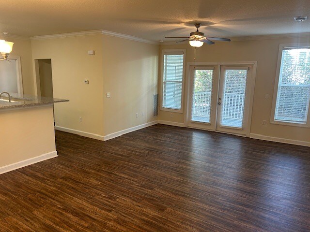 2BR, 2BA Living Room, Dining Room & Kitchen - Seasons at Cane Creek