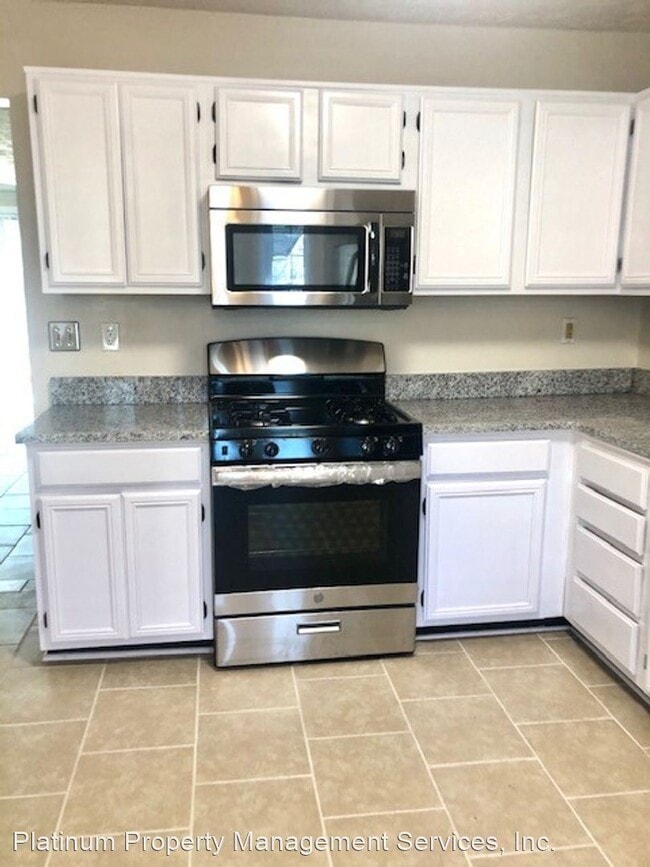 Building Photo - 2 br, 2.5 bath House - 6574 Meadow Green Cir