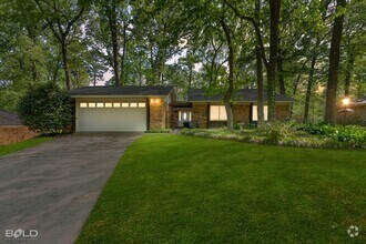 Building Photo - 8718 Woodstock Dr