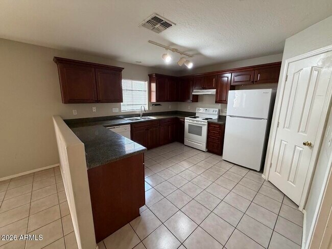 Foto del edificio - 12809 W Dreyfus Dr