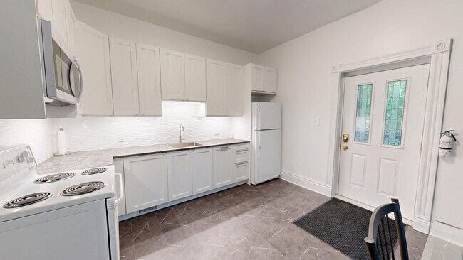 Building Photo - BEAUTIFULLY RENOVATED WOODFIELD ONE BEDROO...