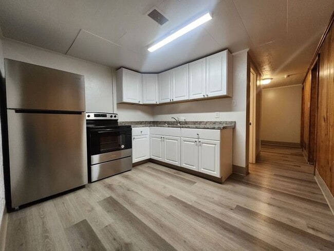 Photo - Stylish 2BR w/ LVP Flooring & Fenced Yard on Filmore Street! Move-In Special: First Full Month Free! House
