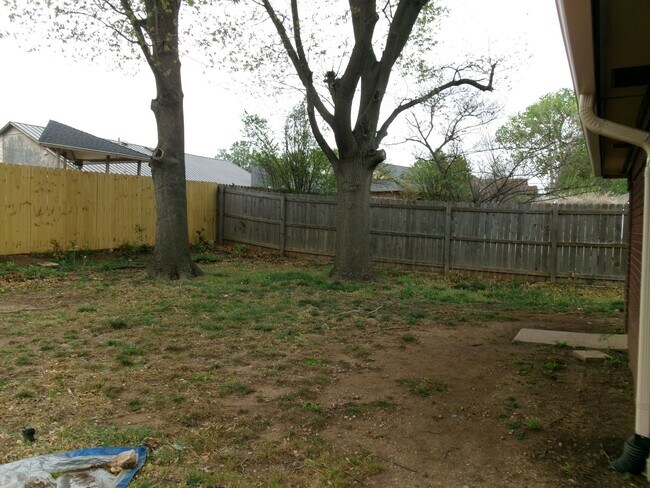 Building Photo - Pets Negotiable with Owner Approval!