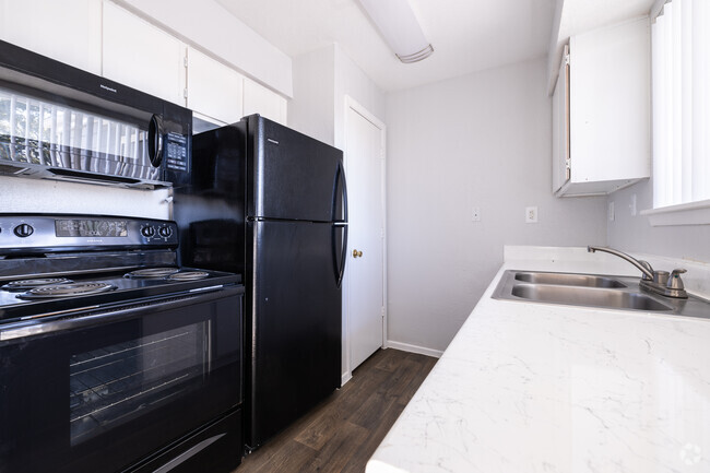 Kitchen - 2BR, 1BA - 818SF - Carriage Woods Apartments