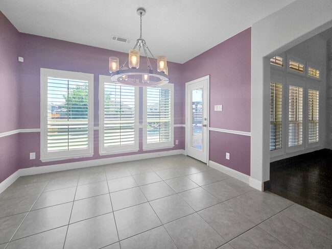 Building Photo - Immaculate 4-Bedroom Home with Luxury Upgr...