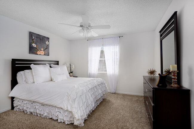 Bedroom with bed and dresser displayed. - Palms of Boca Del Mar