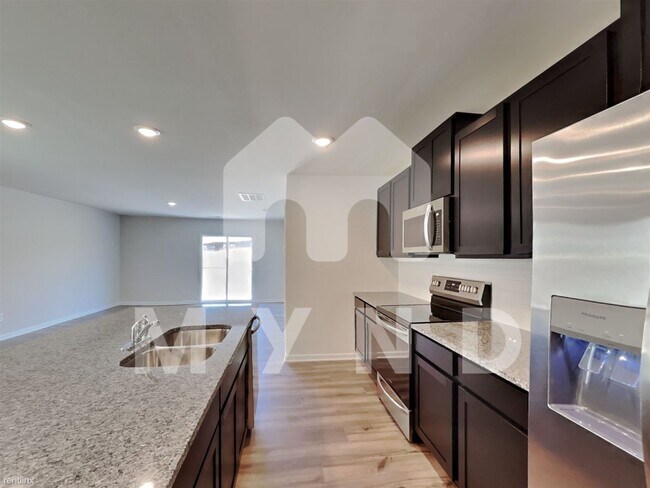 Building Photo - 5 br, 2.5 bath House - 5211 Spring Breeze ...