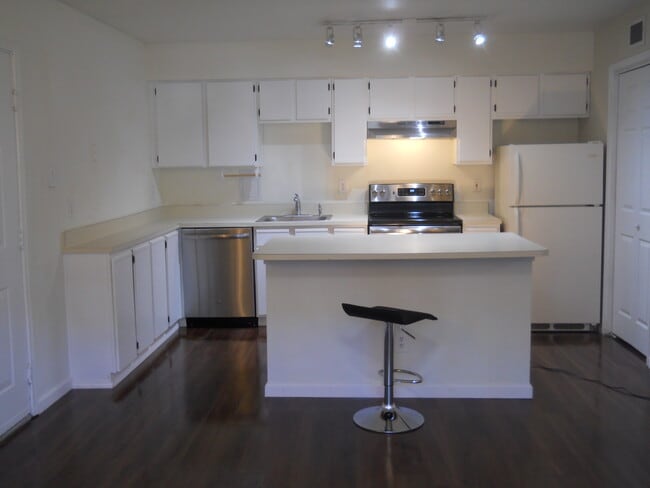 Kitchen and island - 3303 Wyndham Cir