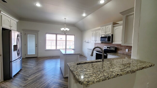 Kitchen with an island - 3830 Bettes Ln