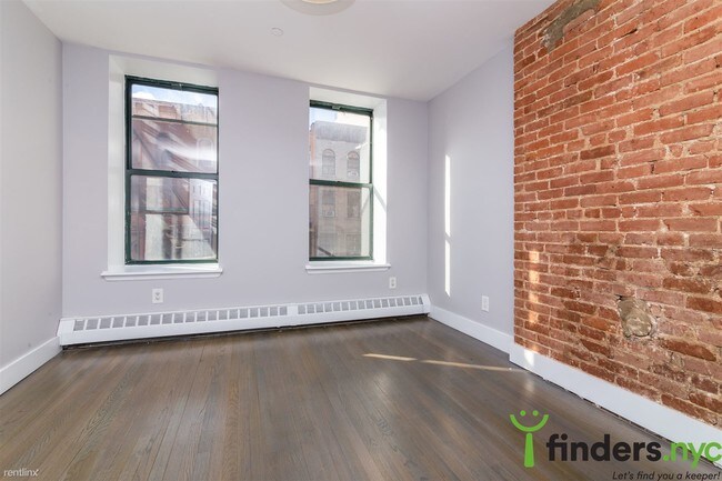 Foto del edificio - 3 br, 1 bath Apartment - 21 W 131st St 2D