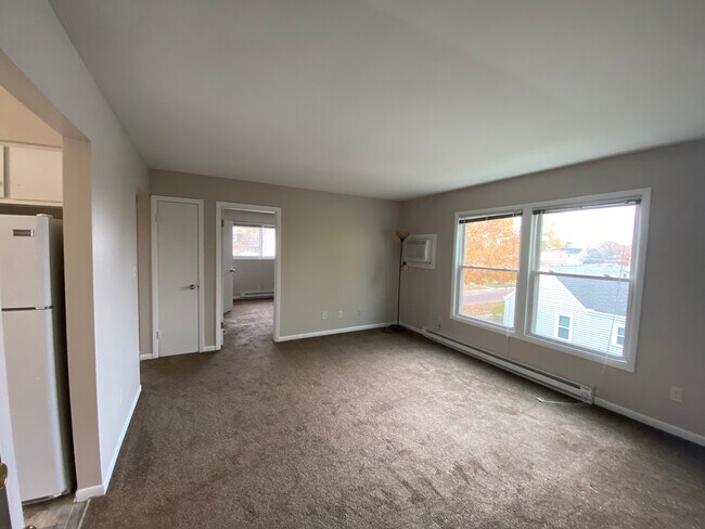 Big, bright, warm living room with plenty of natural light! - 316 S 2nd St
