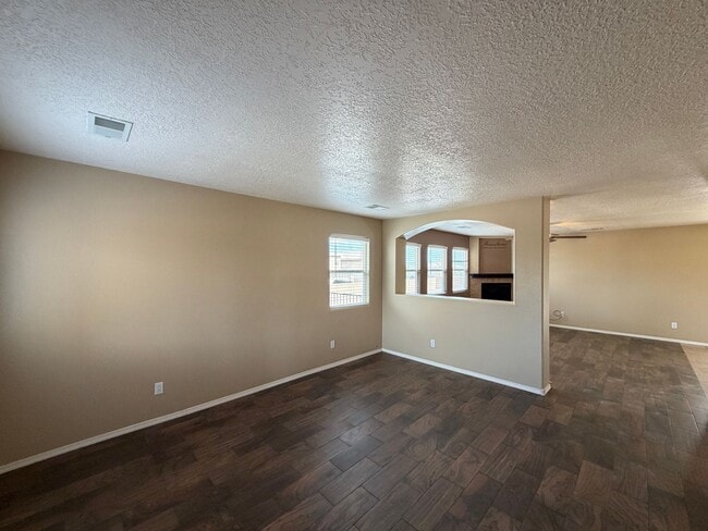 Building Photo - 4 Bedroom Home Available Near McMahon Blvd NW & Universe Blvd NW!