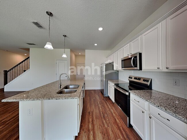 Foto del edificio - 4706 Reisswood Loop