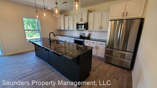 Building Photo - 3 br, 2.5 bath House - 4409 Mashie Dr