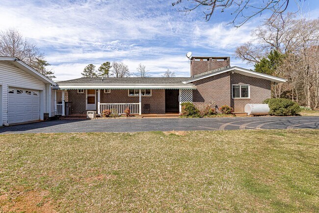 Building Photo - Price Improvement! Private Setting, Yard M...