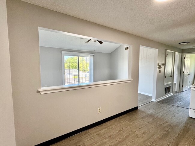 View of living area from kitchen - Quaker Estates