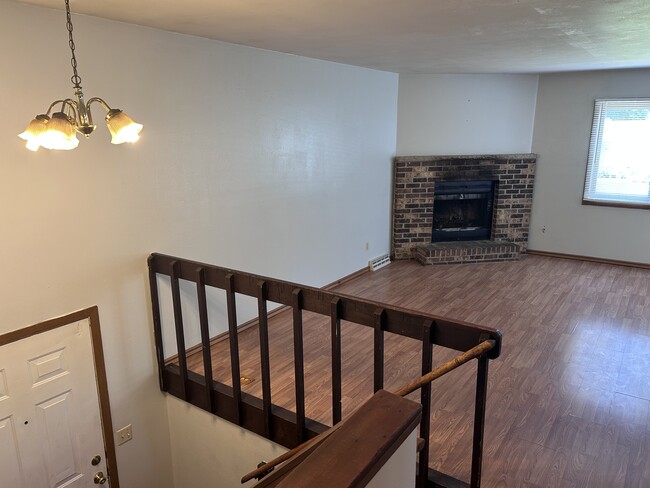 Foyer and living room with hardwood floors - 1230 S Thompson Dr