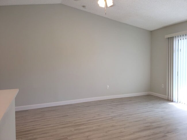 Building Photo - Ground Level Condo; Private Driveway; Corn...
