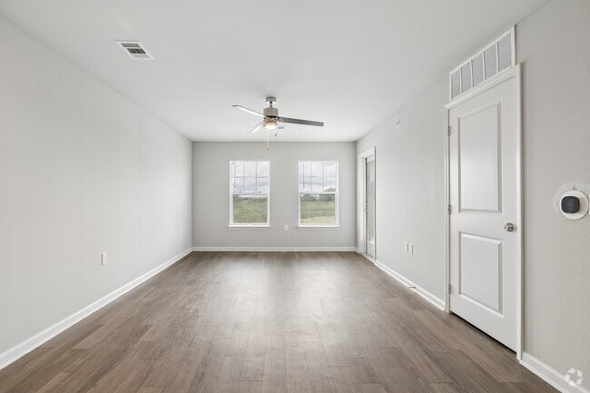 2BR, 2BA - 1,024SF - Living Room - Agave East Apartments