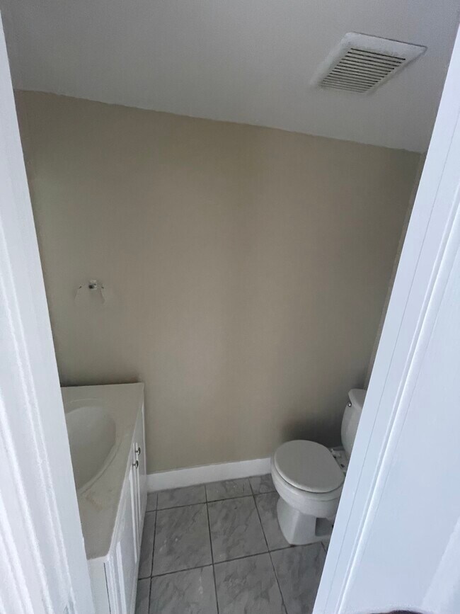 Down Stairs toilet - 2446 NW 52nd Ave
