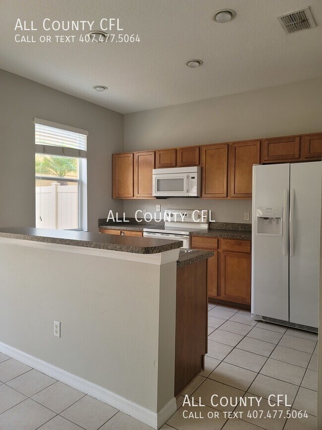 Foto del edificio - 10126 Ridgebloom Ave