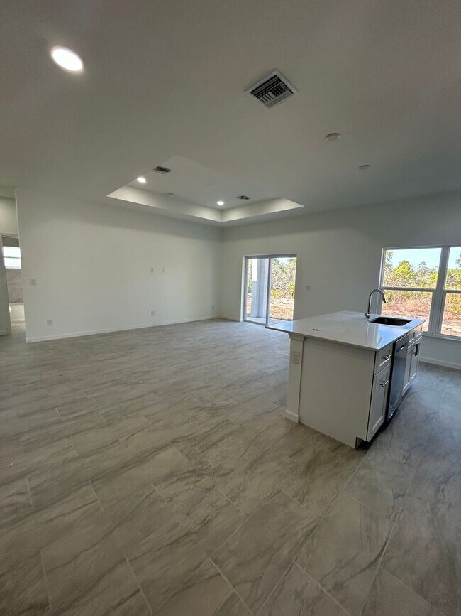 Foto del edificio - JUST BUILT! Spacious 4/2/2 Home -Perfect for Your Family in SW Lehigh Acres