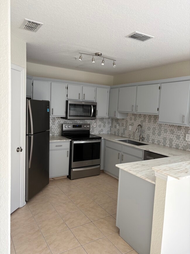 Photo - 1701 The Greens Way Apartment